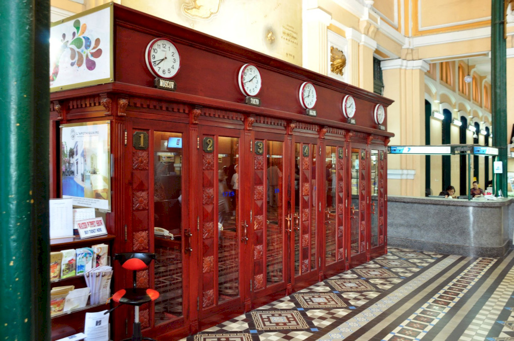 The vintage wooden telephone booths at the Saigon Central Post Office offer a charming glimpse into the past